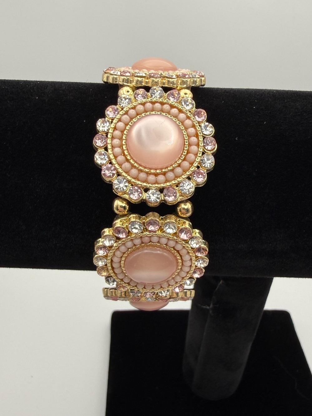 Charming Charlie Gold-Tone Bracelet with Pink Cabochons and Crystal Accents